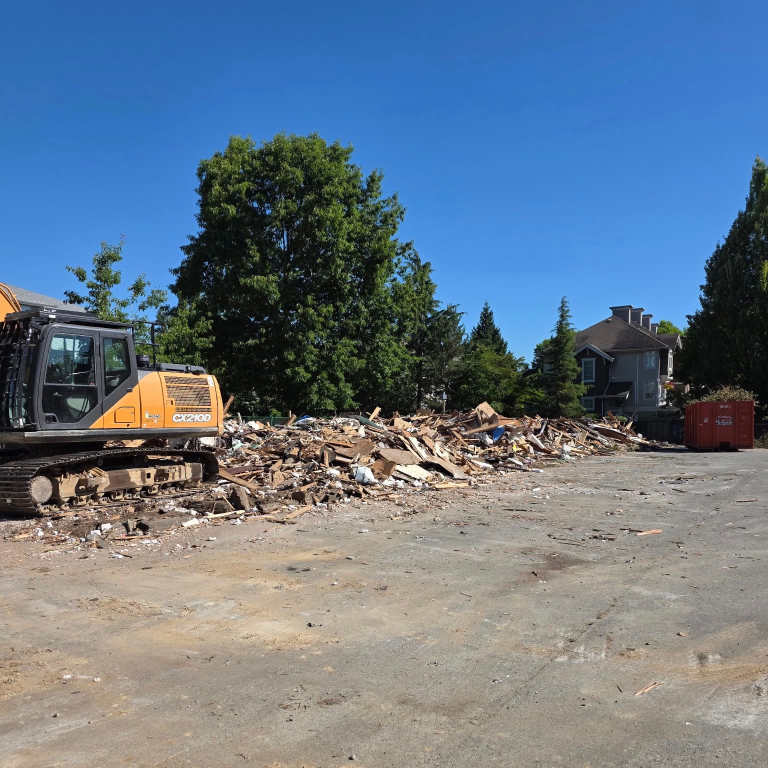 Demolition underway at 20675 Eastleigh Crescent — Kamilia site clearing, June 2026