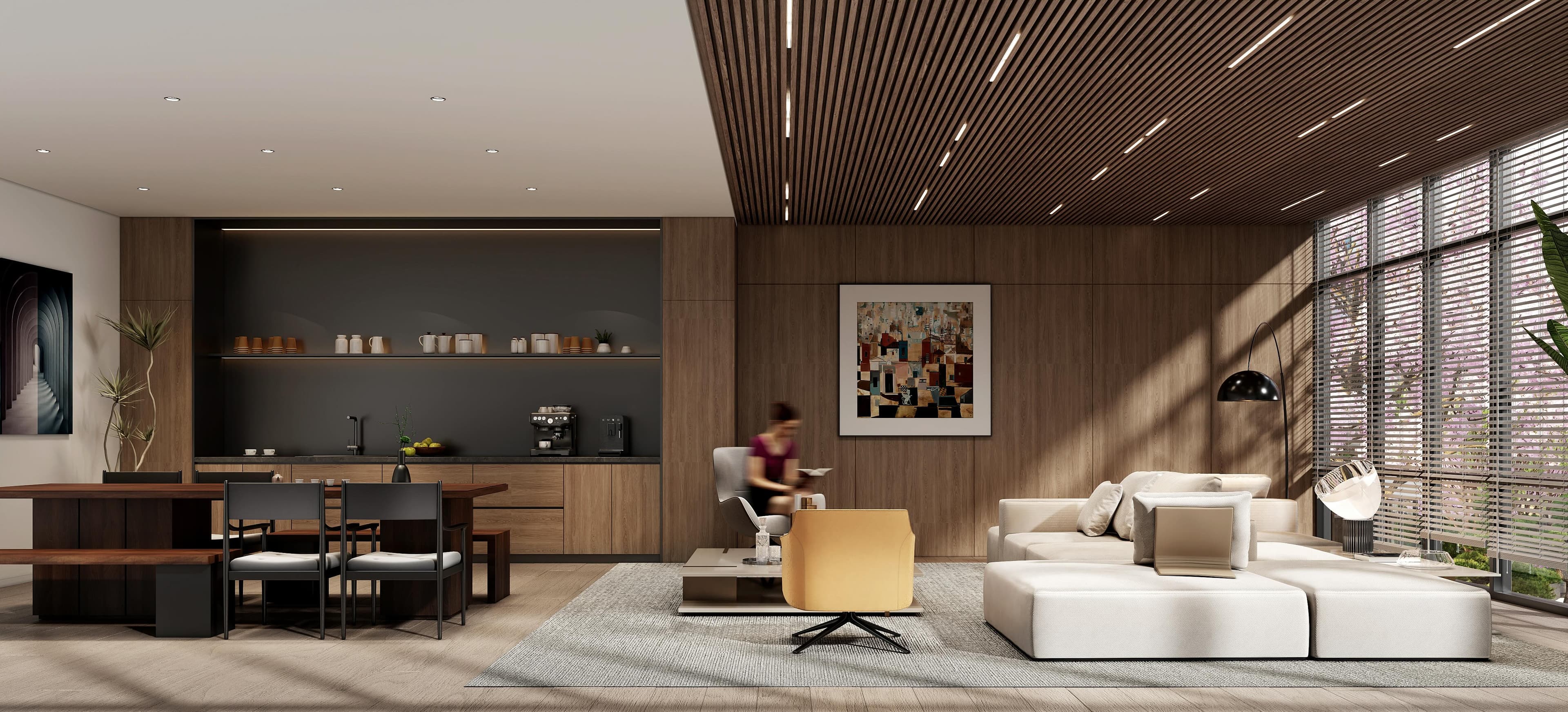 Kamilia resident lounge with warm wood ceiling and modern furnishings